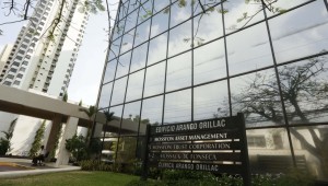 A marquee of the Arango Orillac Building lists the Mossack Fonseca law firm in Panama City, Sunday, April 3, 2016. German daily Sueddeutsche Zeitung says it has obtained a vast trove of documents detailing the offshore financial dealings of the rich and famous. The International Consortium of Investigative Journalism says the latest trove contains includes nearly 40 years of data from the Panama-based law firm, Mossack Fonseca. The company didn't immediately respond to a request for comment. (AP Photo/Arnulfo Franco)
